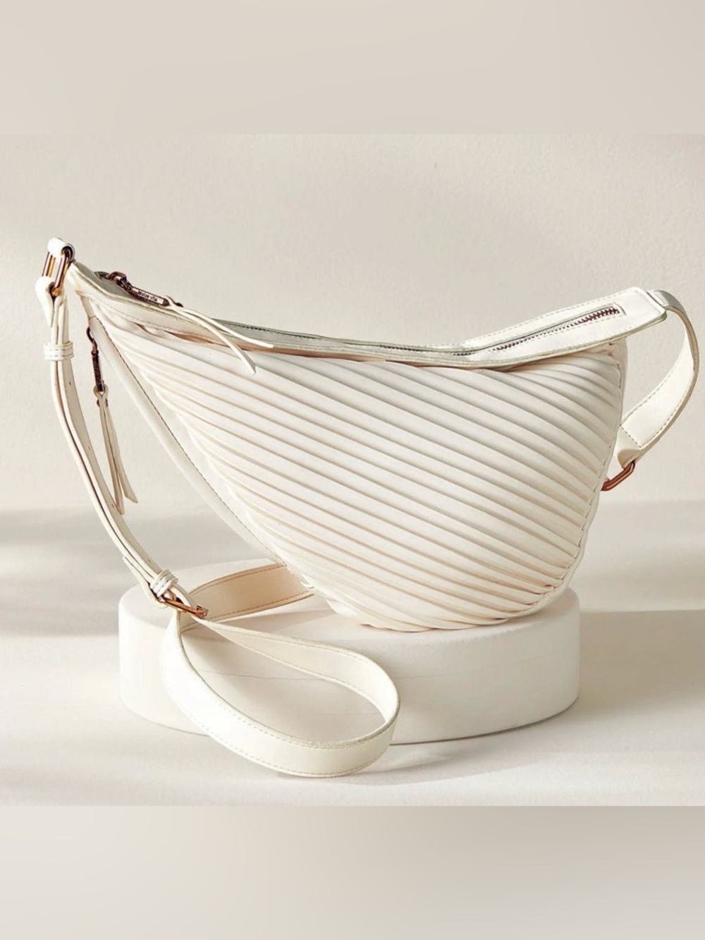Dolce Vita Bone colored Pleated Crossbody Bag. Top zipper closure. NWT